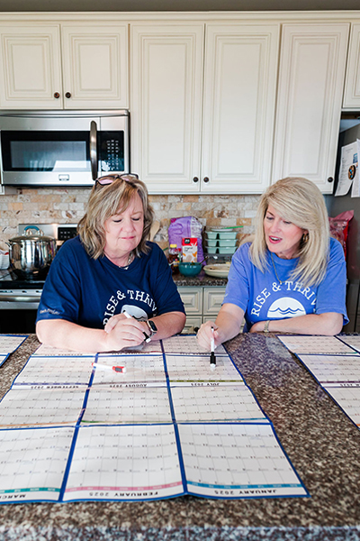 Business coach Dawn McGee leads a client through a business planning exercise